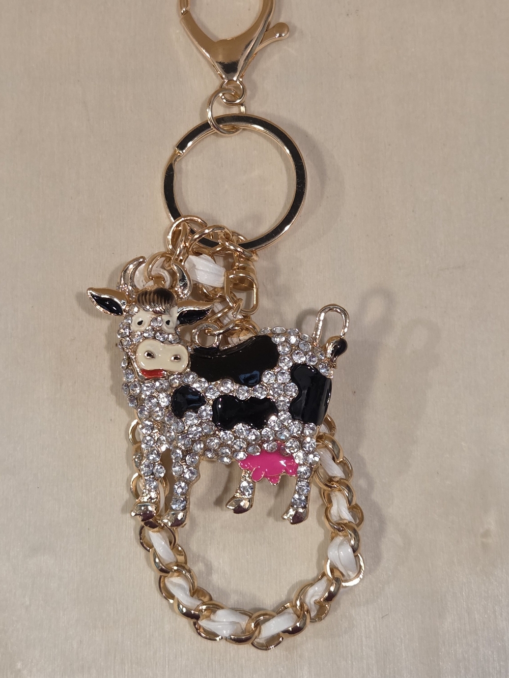 Sparkly Rhinestone Holstein Cow Bag Charm Gold Woven Leather Chain Keychain